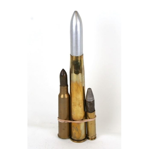 1063 - Three inert artillery rounds, the tallest dated 1943 has an overall height of 44cms (17.25ins), the ... 