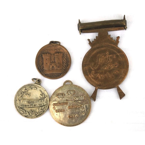 1068 - A 1916 Verdun medal, a 1919 Great War medal, a WW2 D-Day medal together with a Middle East medal