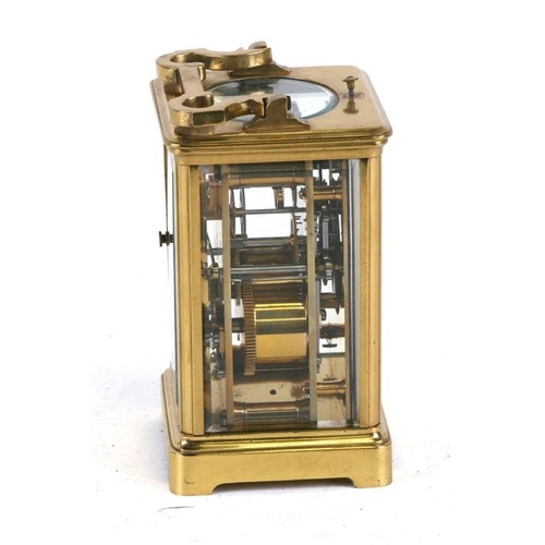 131 - A brass cased repeater carriage clock, the white enamel dial with Roman numerals, the movement strik... 