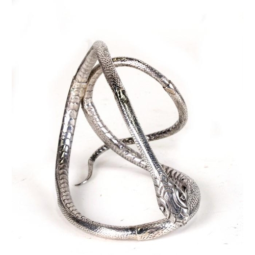 133 - An Indian white metal snake, 12.5cms (5ins) high.