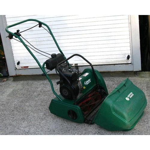 14 - A Suffolk Punch petrol cylinder mower with 40cms (16ins) cut, instructions and original bill of sale... 