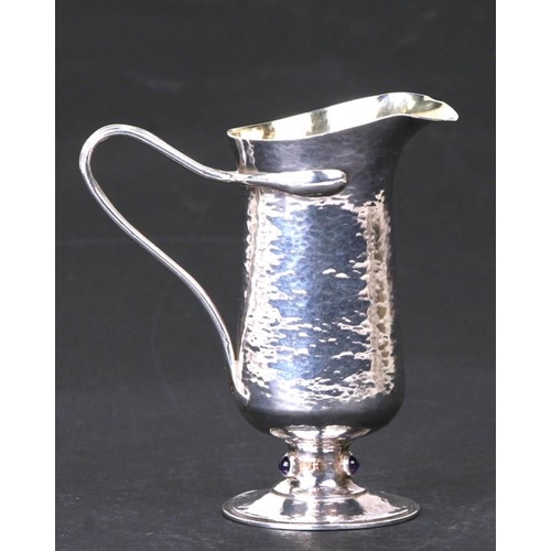 159 - A Guild of Handicraft Arts & Crafts silver cream jug designed by Charles Robert Ashbee, decorated wi... 