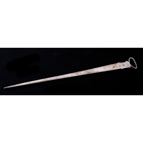 194 - A George III silver meat skewer with indistinct London hall mark.32cm (12.5 ins) long   113g