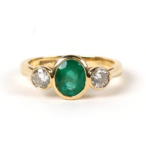 225 - An 18ctct gold emerald and diamond three stone . Emerald approx. 2ct, diamonds approx. 0.5ct.  Appro... 