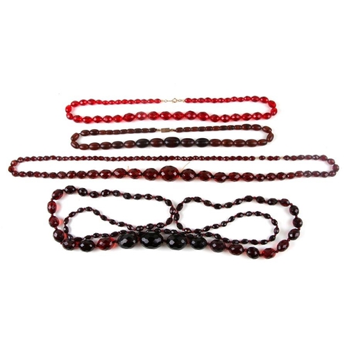 229 - A quantity of cherry amber bead necklaces to include four long necklaces, four faceted cherry amber ... 