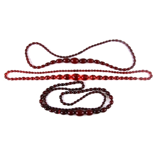 229 - A quantity of cherry amber bead necklaces to include four long necklaces, four faceted cherry amber ... 