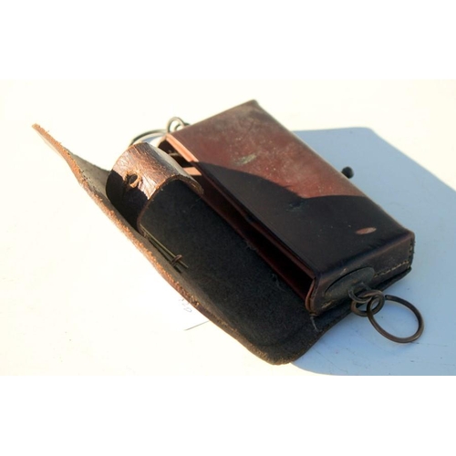 319 - A late 19th or early 20th century Cameron Highlanders brown leather cross belt ammunition pouch