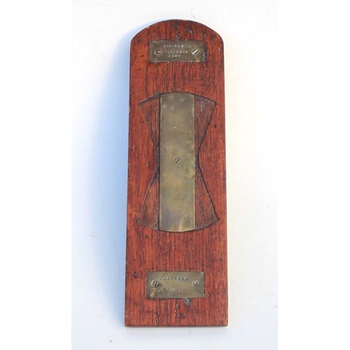 340 - A Grenadier Guards trench art cribbage board of  brass on a hardwood base, inscribed with the regime... 