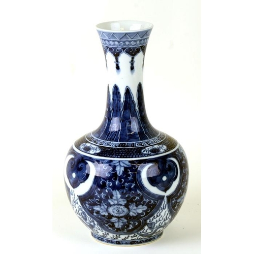 380 - A large Chinese blue & white vase decorated with flowers and dragons, four character blue mark to th... 