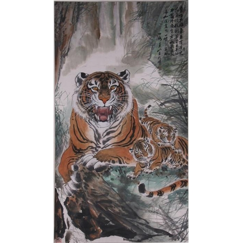 398 - A large Chinese scroll picture depicting a tiger and cubs with calligraphy, 94 by 175cms (37 by 69in... 