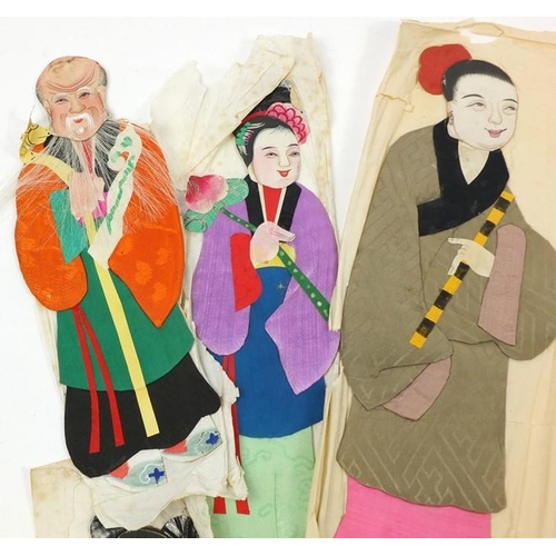 404 - A group of early 20th century Chinese silk and hand painted paper figures