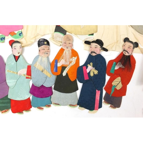 404 - A group of early 20th century Chinese silk and hand painted paper figures