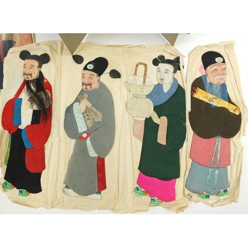 404 - A group of early 20th century Chinese silk and hand painted paper figures