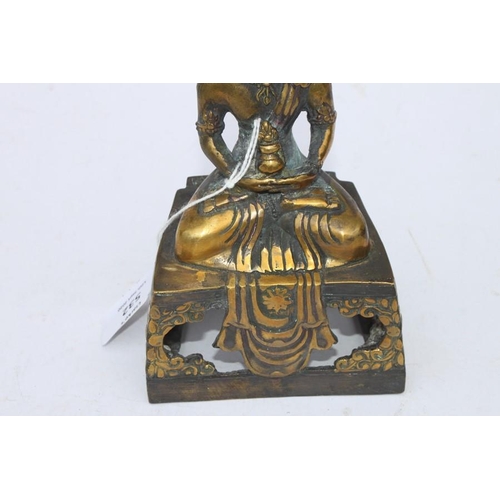 496 - A Chinese bronze figure of a seated Buddha in meditation, 16cms (6.25ins) high.