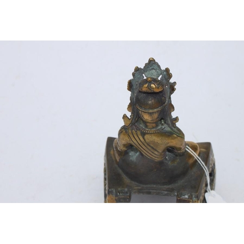 496 - A Chinese bronze figure of a seated Buddha in meditation, 16cms (6.25ins) high.