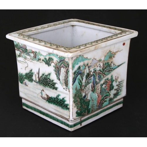 503 - A Chinese famille rose square form planter decorated with landscape scenes, 24cms (9.5ins) wide.