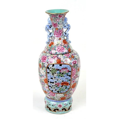 506 - A Chinese Republic millefiore reticulated vase with red Qinglong seal mark to the underside, 35cms (... 