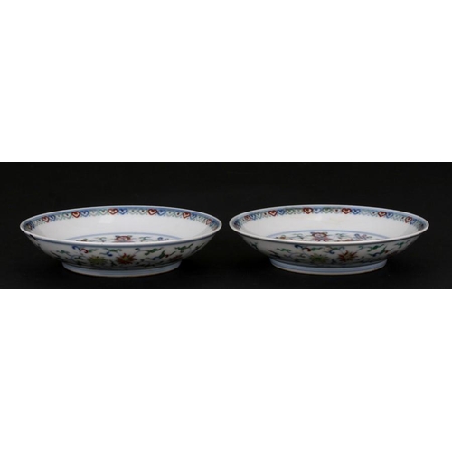 529 - A pair of Chinese shallow dishes decorated with foliate scrolls, blue seal mark to the underside, 16... 