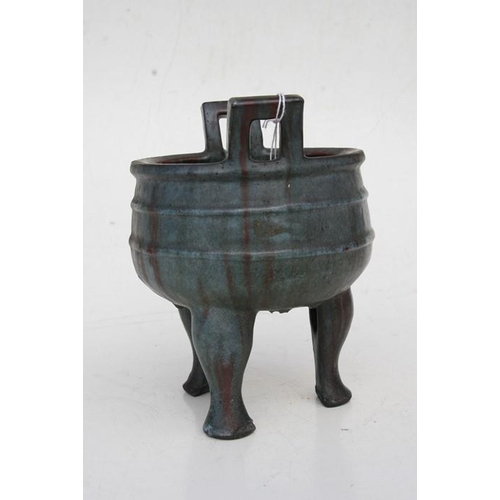 535 - A Chinese two-handled pottery censer on three legs, multi-character seal mark to the underside, 20cm... 