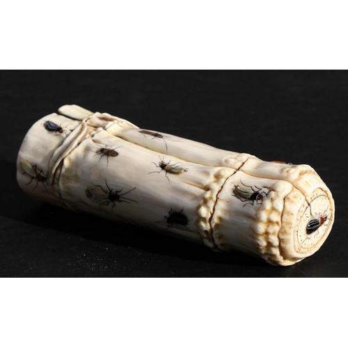 539 - An Oriental carved ivory wrist stand in the form of a bamboo section with shibayama insect decoratio... 