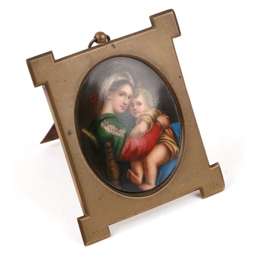 644 - After Raphael, an oval portrait miniature porcelain plaque, Madonna Della Sadia, mounted in a brass ... 