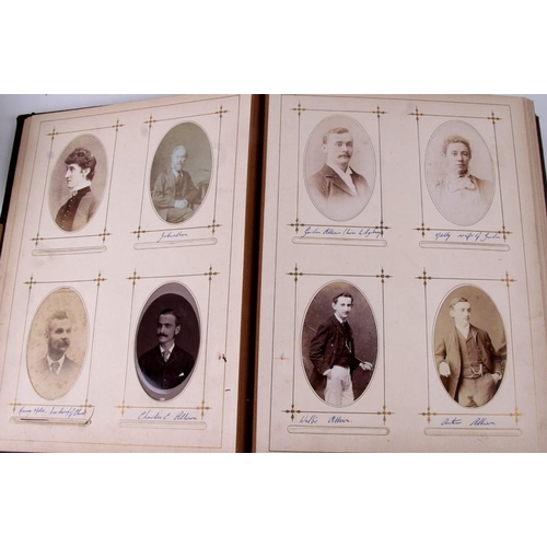 82 - A Victorian leather bound photograph album containing mainly family portraits; together with three o... 