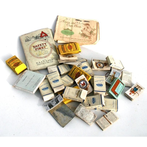 852 - A large quantity of John Player and Wills cigarette cards in albums and original cardboard boxes.