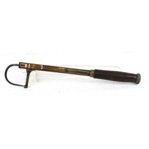 88 - A telescopic brass fishing gaff with turned mahogany handle, 101cms (39.75ins) long extended.