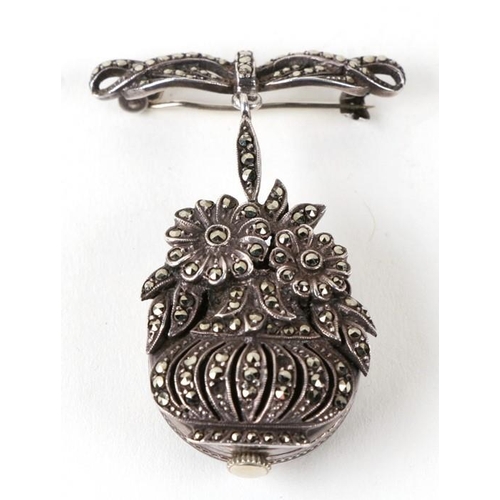 910 - A silver fob watch / brooch in the form of a basket of flowers set with marcasite.4.5cm (1.75 ins) h... 