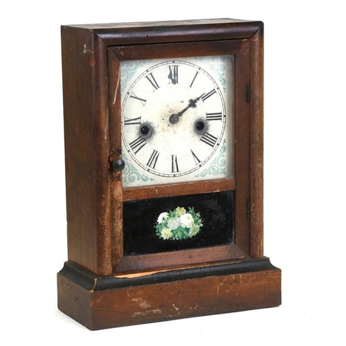 913 - A late 19th century Waterbury Clock Co. mantle clock, the white painted dial with Roman numerals, 25... 