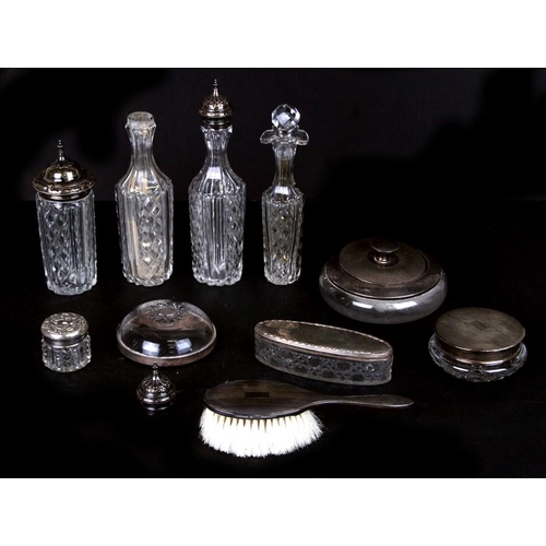 923 - A silver topped powder puff jar; together with a set of silver topped condiments and other items.