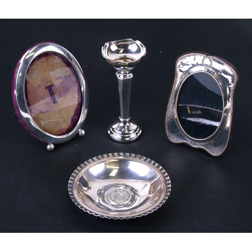 929 - Two silver photo frames; together with a silver stem vase; and a 925 silver Peruvian coin dish (4).