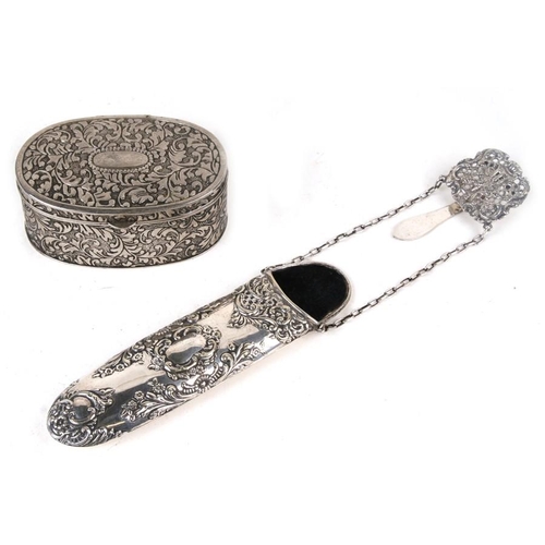 934 - A silver plated hinged chatelaine spectacles case with repousse work and velvet lining; together wit... 