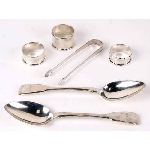 946 - A pair of silver serving spoons, London 1834, initialled 'H',; together with a pair of silver sugar ... 