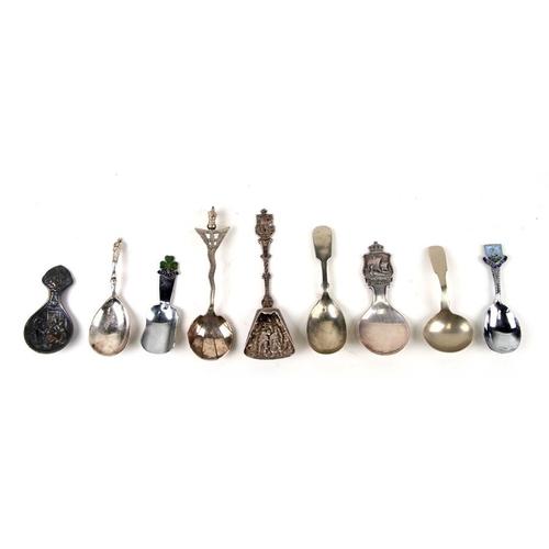 948 - A group of silver plated and white metal caddy and teaspoons to include a Dutch example.