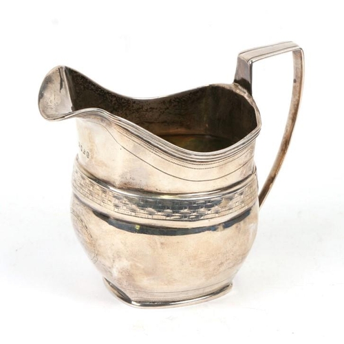 950 - A George III silver cream jug of helmet form, London 1805, weight 128g, 10cms (4ins) high.