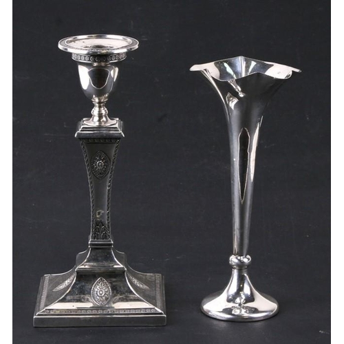 968 - An Elkington silver candlestick of classical form, Sheffield 1910, 19cm (7.5 ins) high,  together wi... 