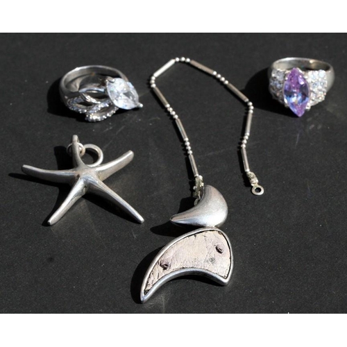 990 - A quantity of silver jewellery to include a crucifix, bracelets and rings Condition Report30g... 