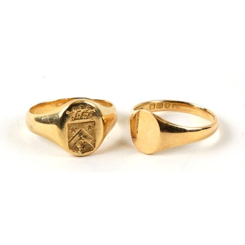 995 - A yellow metal signet ring (test as 18ct) with engraved crest; together with an 18ct gold signet rin... 