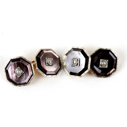 996 - A pair of mother of pearl and seed pearl cufflinks of octagonal form.