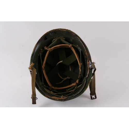 1052 - A Vietnam War period USA military helmet.