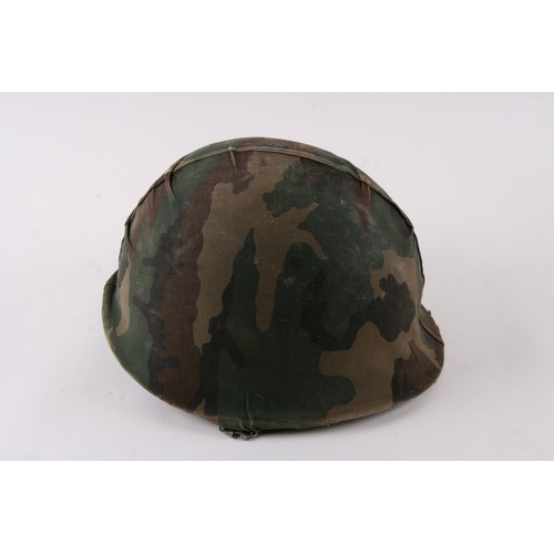 1052 - A Vietnam War period USA military helmet.