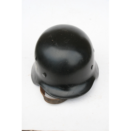 291 - A WW2 Third Reich Nazi M1940 double decal helmet with liner and chin strap. Marked on inside ET 64 a... 