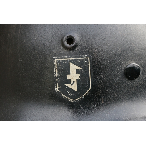 291 - A WW2 Third Reich Nazi M1940 double decal helmet with liner and chin strap. Marked on inside ET 64 a... 