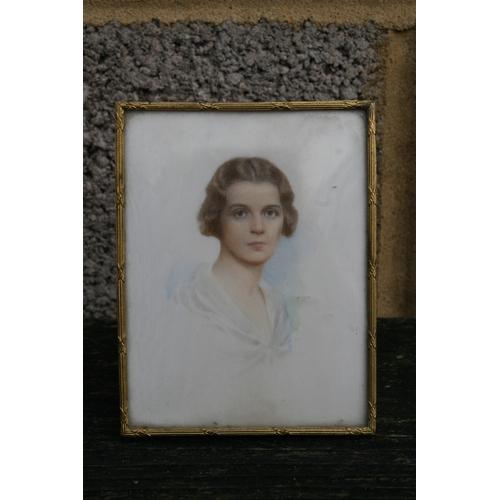 623 - An early 20thy century portrait miniature depicting a young lady, 9 by 11cms (3.5 by 4.75ins).