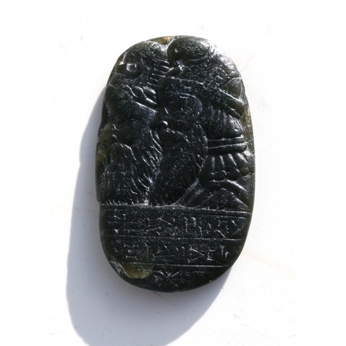 438 - Antiquities.  A Mesopotamian Babylonian cuneiform script stone, 5cm by 3cm  .