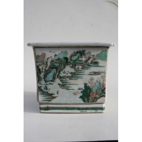 503 - A Chinese famille rose square form planter decorated with landscape scenes, 24cms (9.5ins) wide.