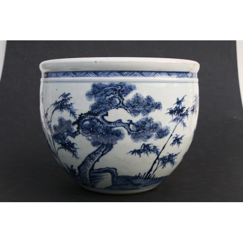 517 - A Chinese blue & white 'Three Friends' pattern planter, 19cms (7.5ins) high.