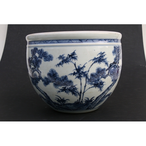 517 - A Chinese blue & white 'Three Friends' pattern planter, 19cms (7.5ins) high.