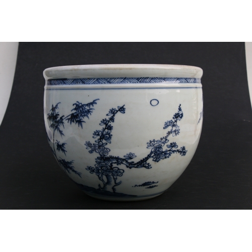 517 - A Chinese blue & white 'Three Friends' pattern planter, 19cms (7.5ins) high.